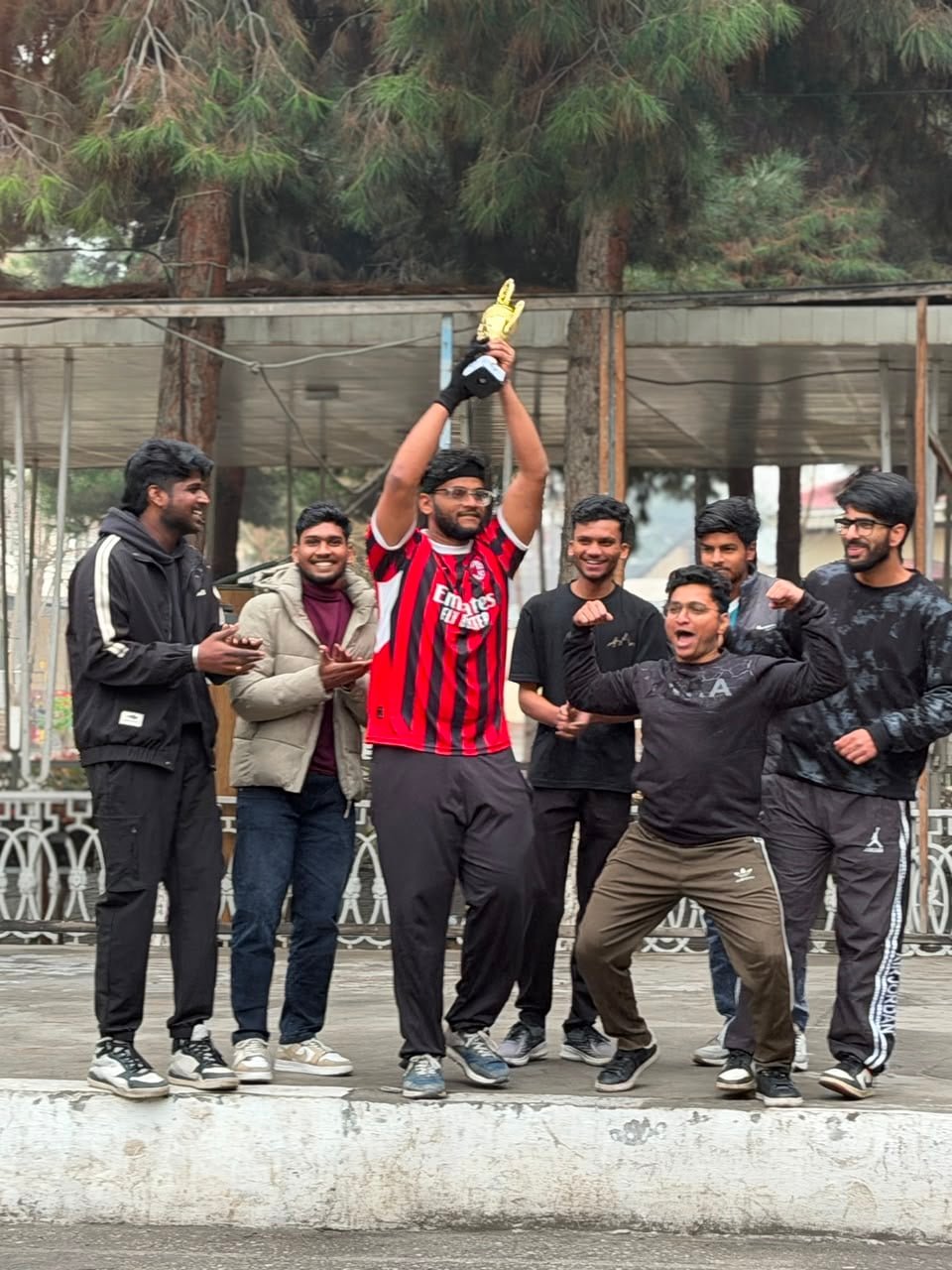 LICHEN students celebrating with their cricket trophy at ASMI